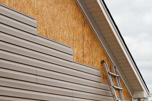 Professional Emergency Siding Repair technician working in Dover, NJ